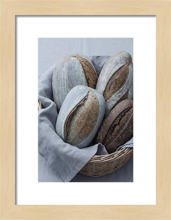 Artisan Bread Loaves In Basket