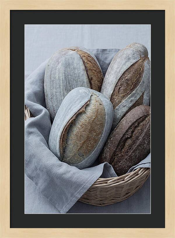 Artisan Bread Loaves In Basket