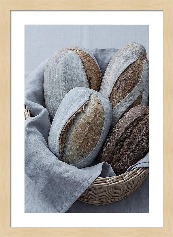 Artisan Bread Loaves In Basket