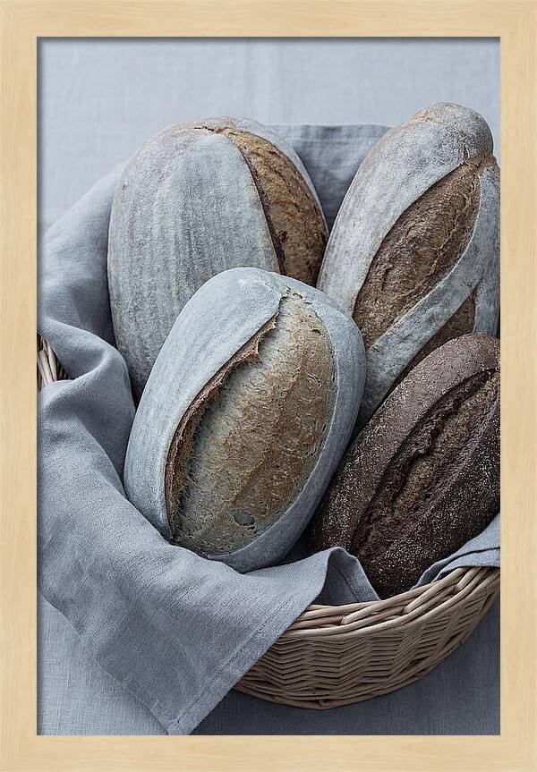 Artisan Bread Loaves In Basket