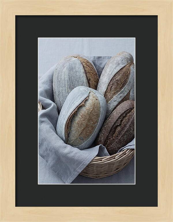 Artisan Bread Loaves In Basket