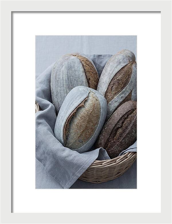 Artisan Bread Loaves In Basket