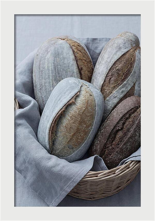 Artisan Bread Loaves In Basket