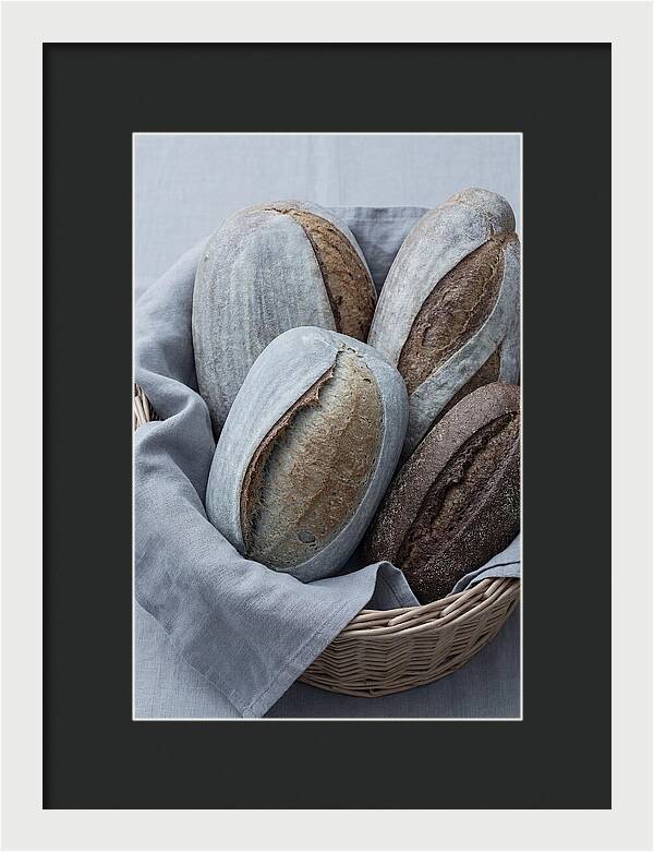 Artisan Bread Loaves In Basket