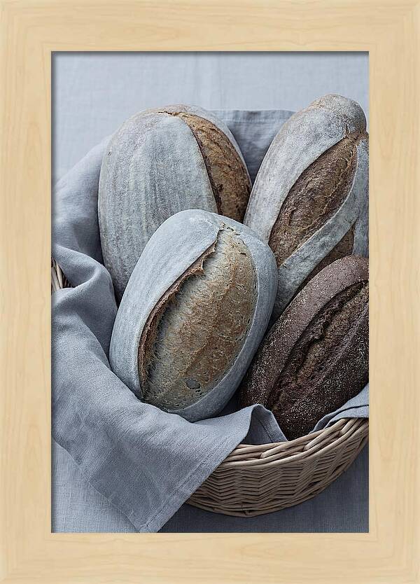 Artisan Bread Loaves In Basket