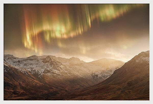 Aurora Borealis Over Majestic Mountains