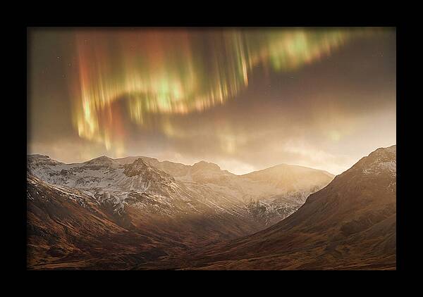 Aurora Borealis Over Majestic Mountains