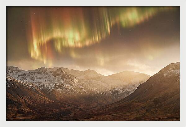 Aurora Borealis Over Majestic Mountains