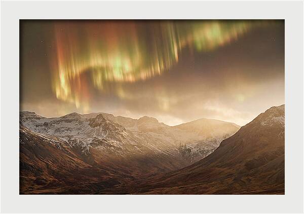 Aurora Borealis Over Majestic Mountains
