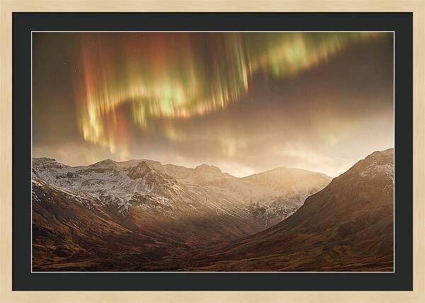 Aurora Borealis Over Majestic Mountains