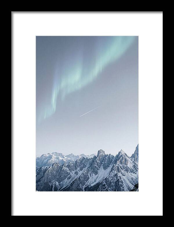 Aurora Borealis Over Majestic Peaks