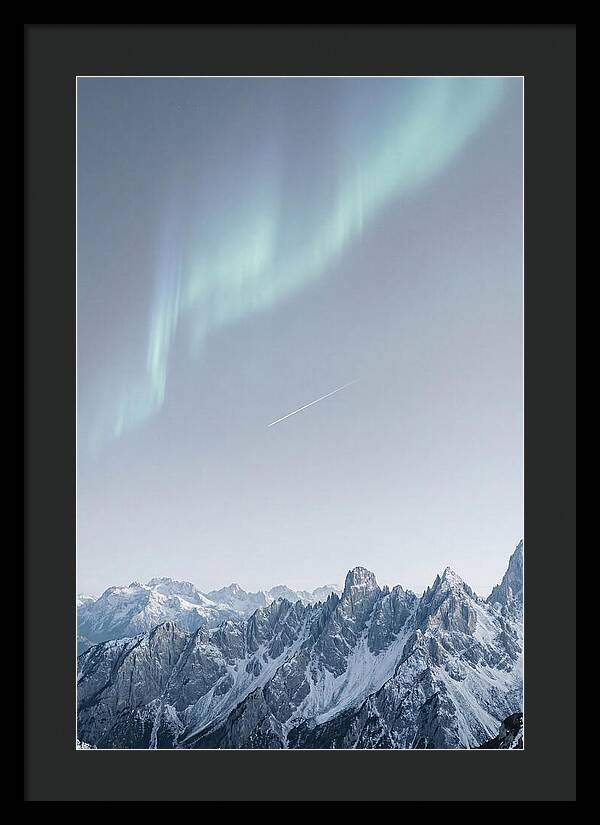 Aurora Borealis Over Majestic Peaks