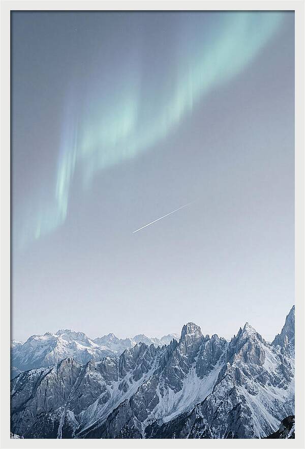 Aurora Borealis Over Majestic Peaks