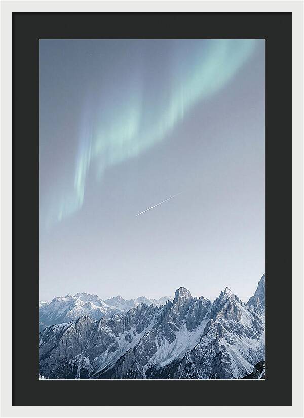 Aurora Borealis Over Majestic Peaks