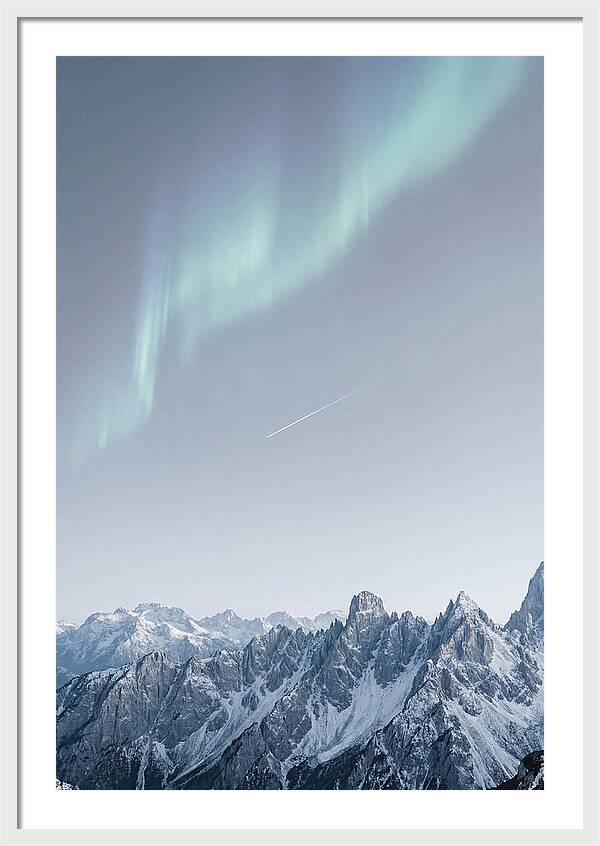 Aurora Borealis Over Majestic Peaks