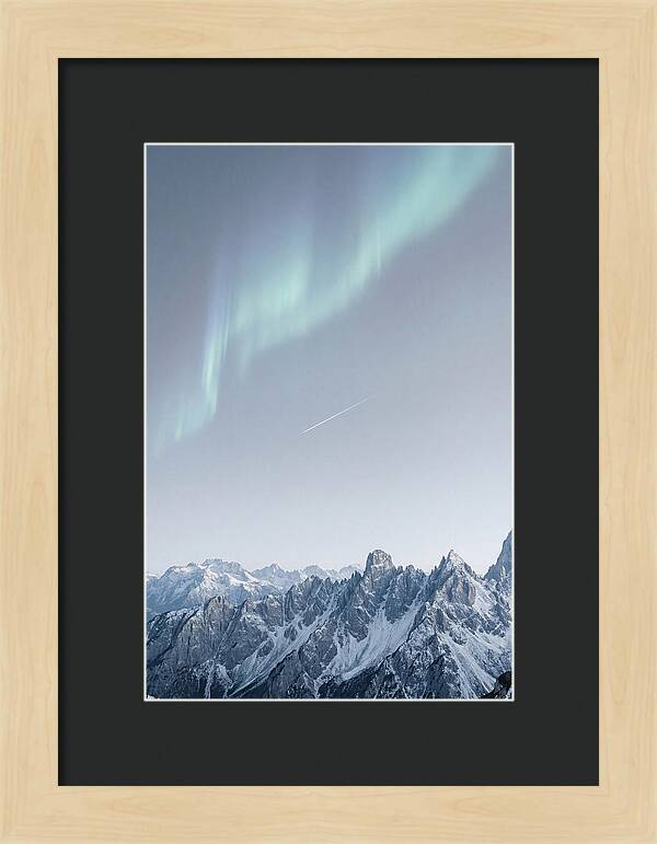 Aurora Borealis Over Majestic Peaks