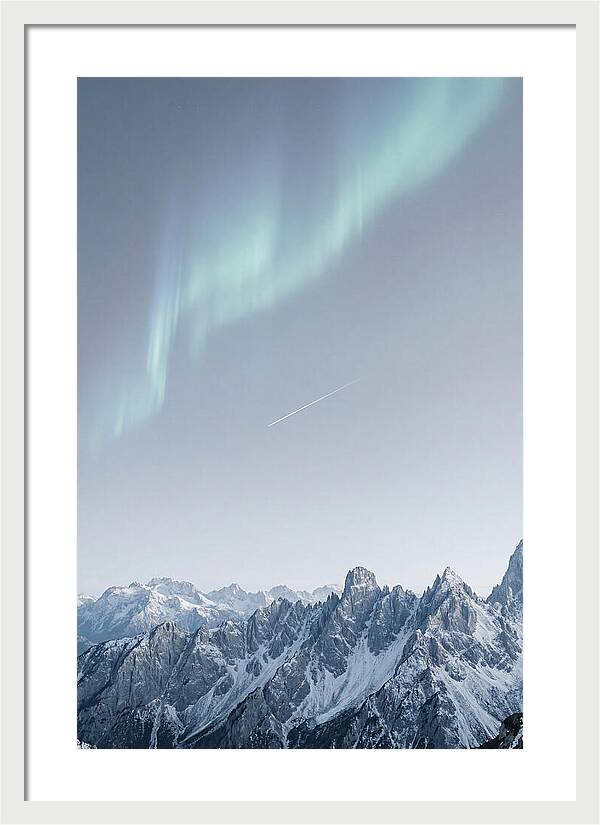 Aurora Borealis Over Majestic Peaks