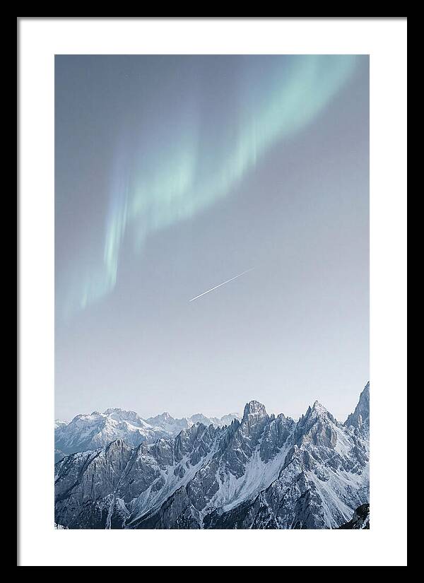Aurora Borealis Over Majestic Peaks