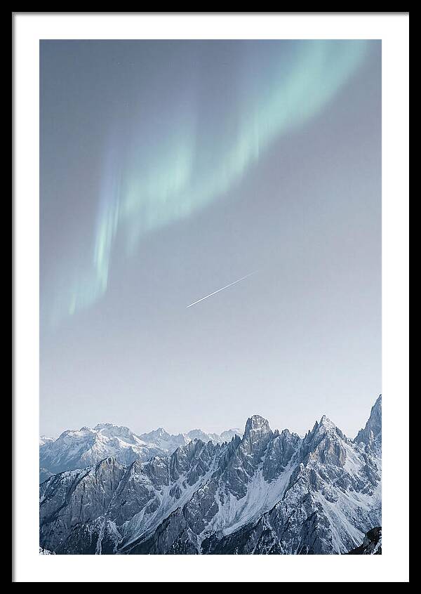 Aurora Borealis Over Majestic Peaks