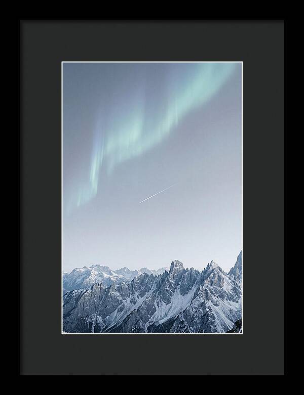 Aurora Borealis Over Majestic Peaks