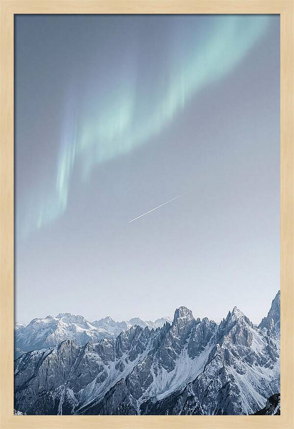 Aurora Borealis Over Majestic Peaks