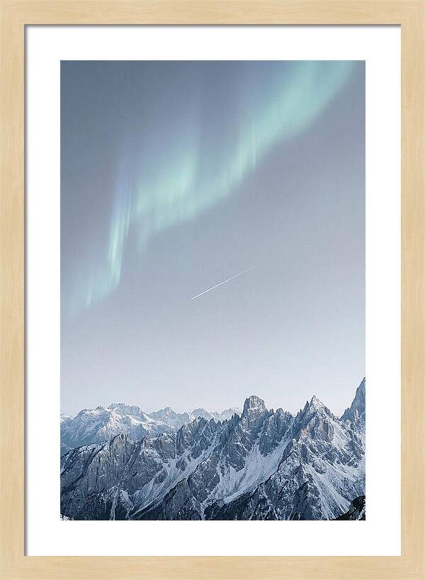 Aurora Borealis Over Majestic Peaks
