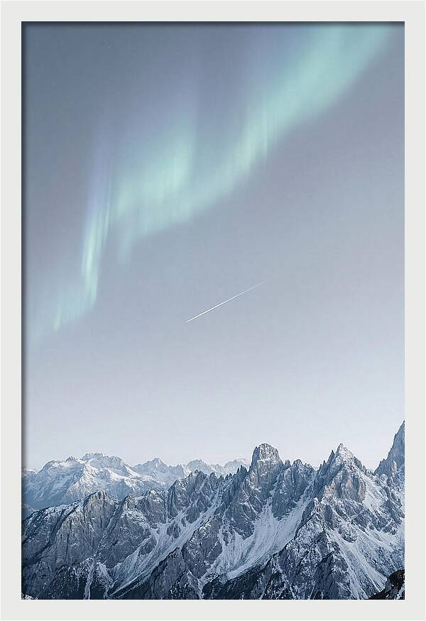 Aurora Borealis Over Majestic Peaks