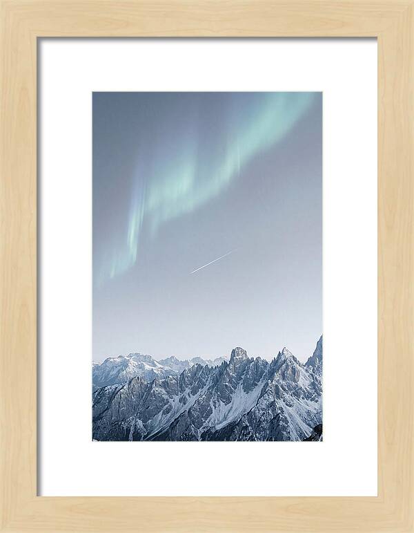 Aurora Borealis Over Majestic Peaks