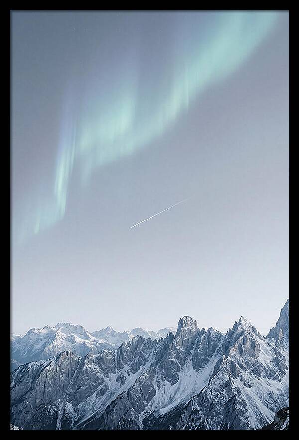 Aurora Borealis Over Majestic Peaks