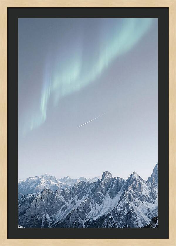 Aurora Borealis Over Majestic Peaks