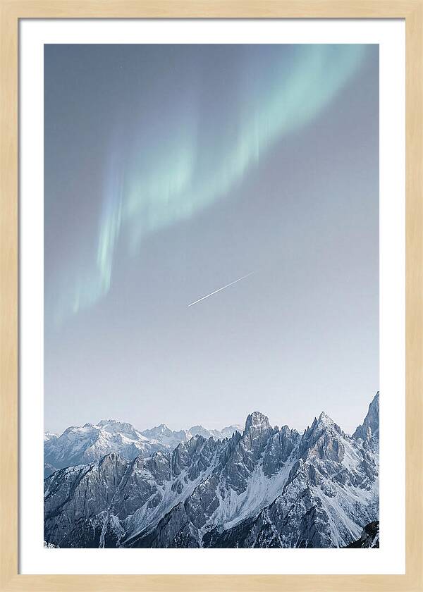 Aurora Borealis Over Majestic Peaks