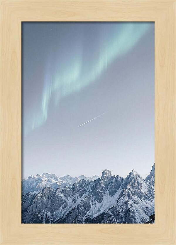 Aurora Borealis Over Majestic Peaks
