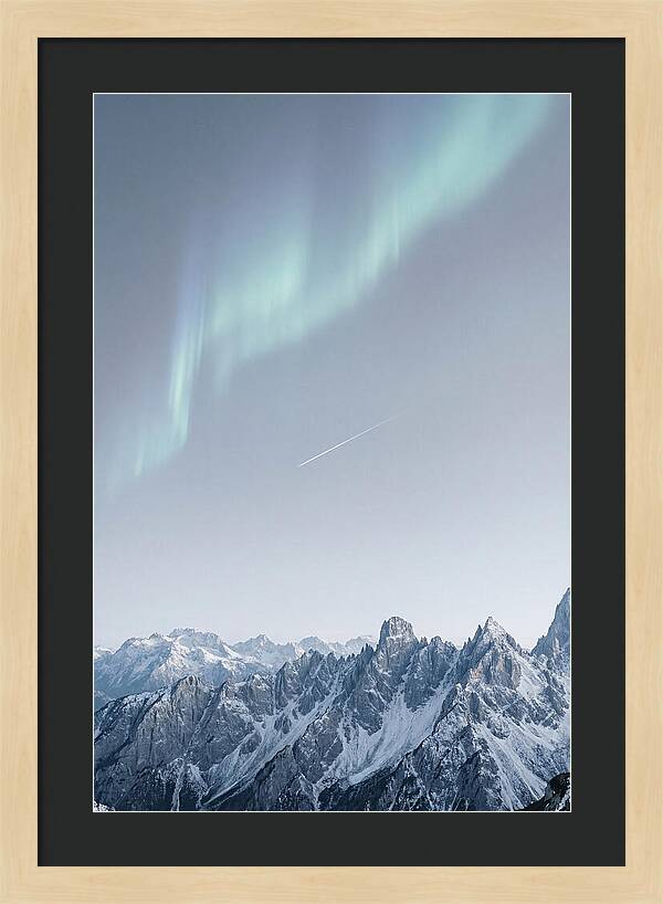 Aurora Borealis Over Majestic Peaks