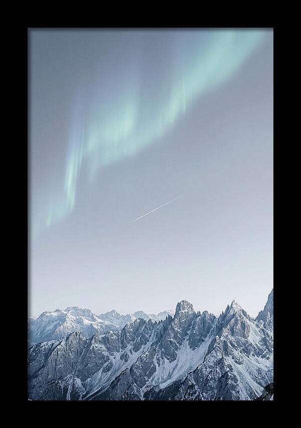 Aurora Borealis Over Majestic Peaks