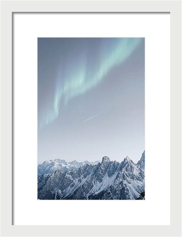 Aurora Borealis Over Majestic Peaks
