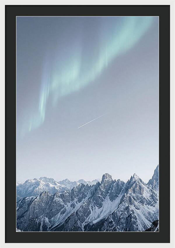 Aurora Borealis Over Majestic Peaks