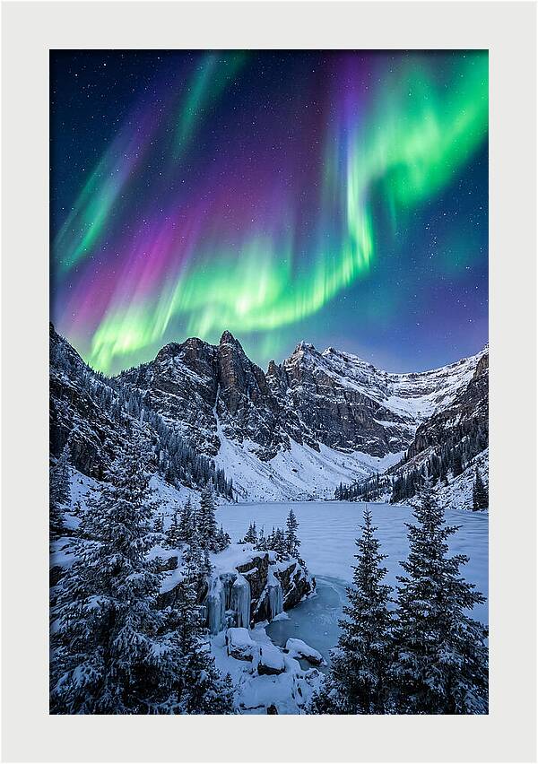 Aurora Over Snowy Peaks