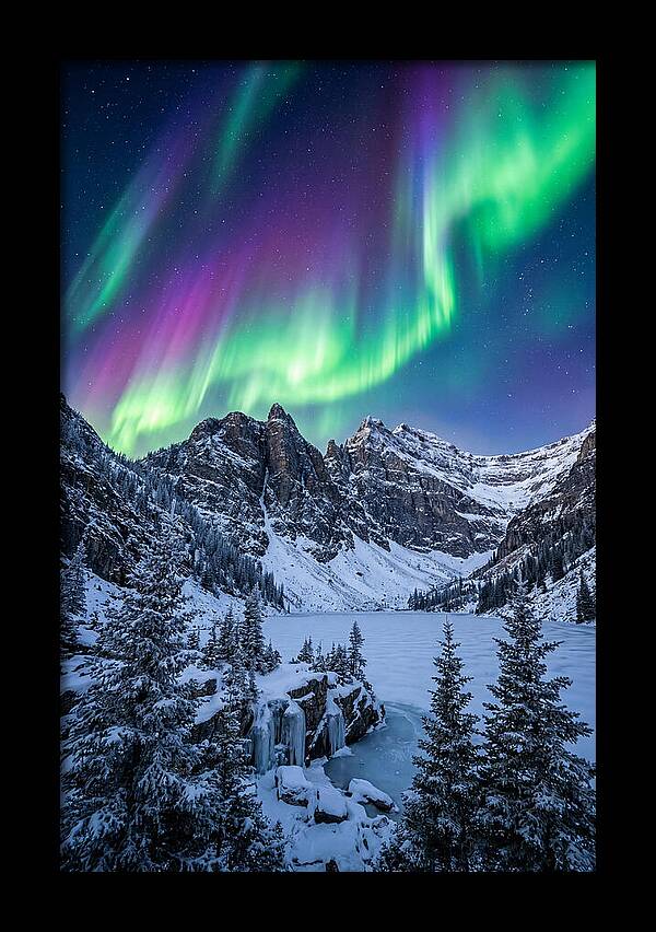 Aurora Over Snowy Peaks