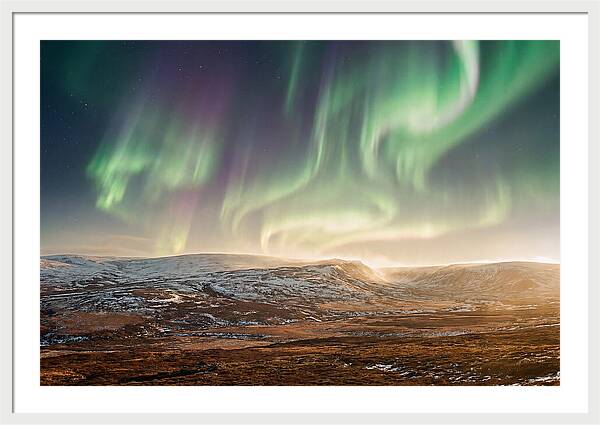 Aurora Swirling In Green And Purple