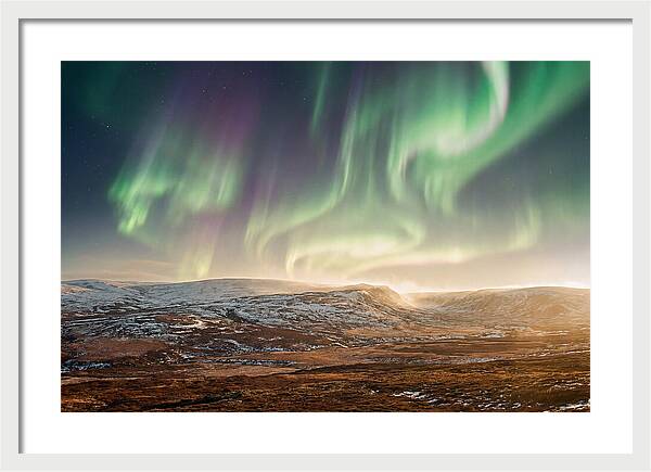 Aurora Swirling In Green And Purple