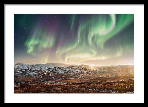 Aurora Swirling In Green And Purple