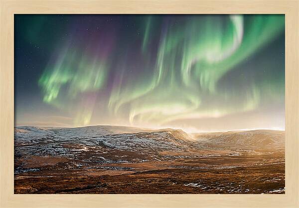 Aurora Swirling In Green And Purple