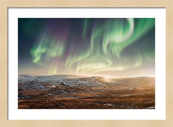 Aurora Swirling In Green And Purple