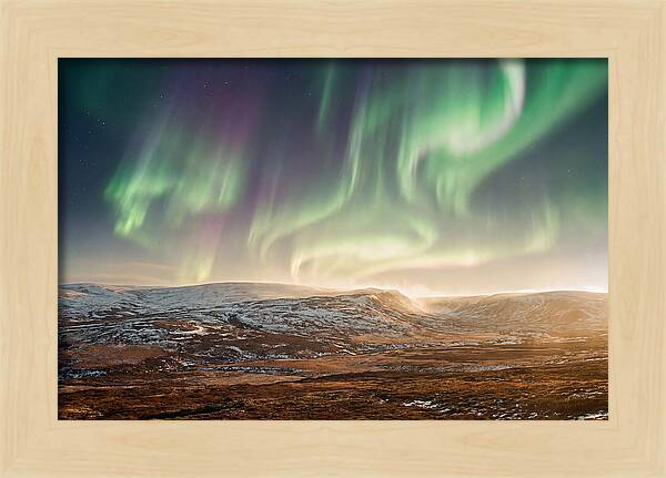 Aurora Swirling In Green And Purple