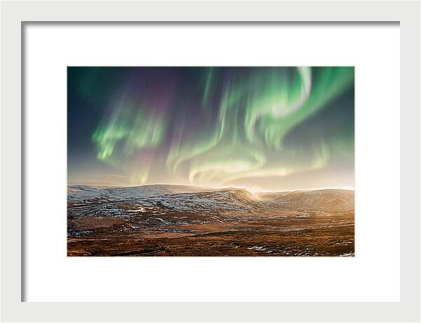 Aurora Swirling In Green And Purple