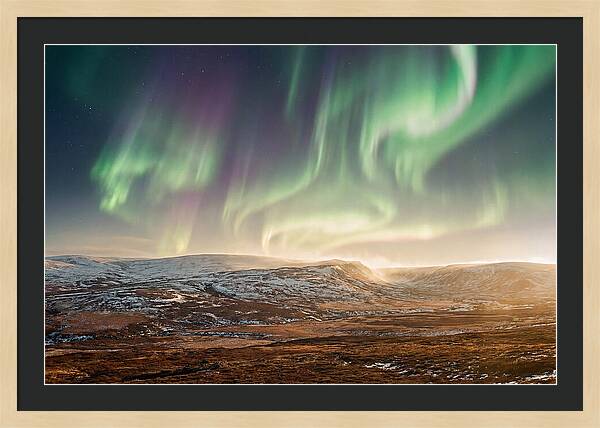 Aurora Swirling In Green And Purple