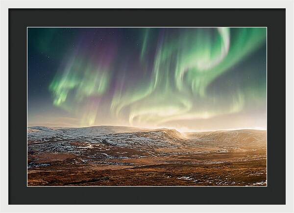 Aurora Swirling In Green And Purple