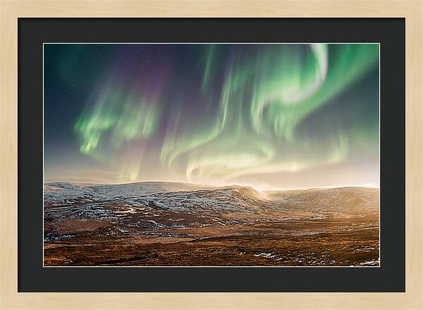 Aurora Swirling In Green And Purple