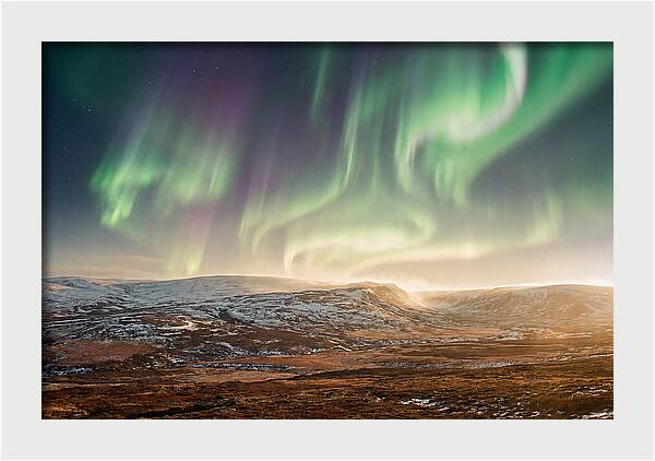 Aurora Swirling In Green And Purple