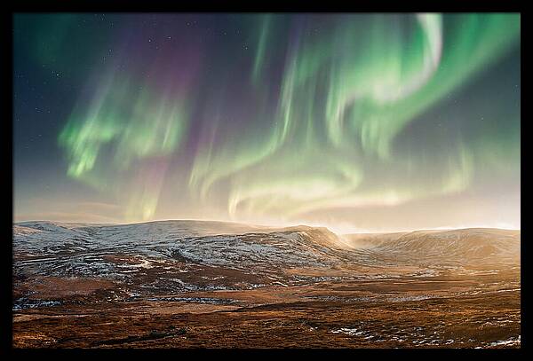 Aurora Swirling In Green And Purple